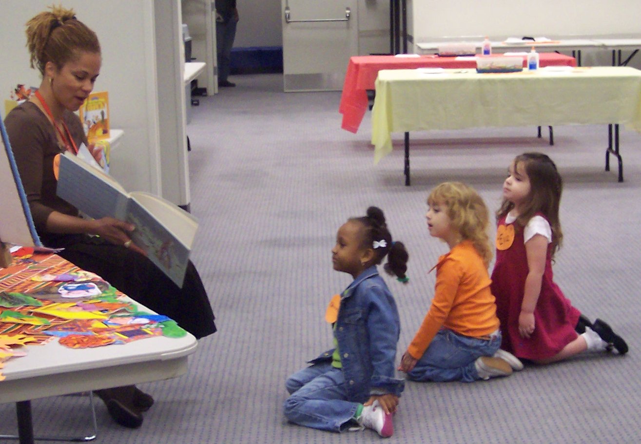 "Story time with Miss Kellee at the library."