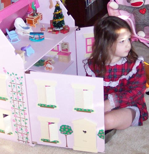 "Santa brought me a doll house!" 