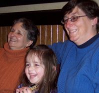 "Celebrating Mommy's birthday with Aunties Mary and Lisa."