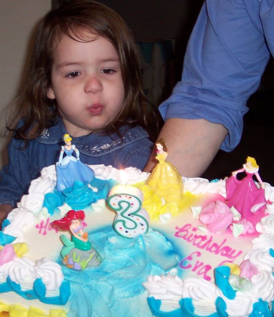 "Blowing out the candle on my princess cake."