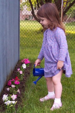 "Watering my flowers." (May 27)