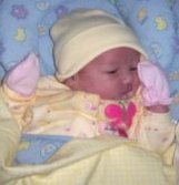 "My first day home." (2 days old)