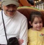 Riding the merry-go-round with Daddy.