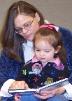 Reading at the library.