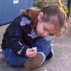 Drawing with chalk on the back porch.