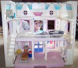 Playing with my doll house from Aunt Mary.