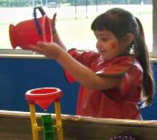 Playing at the water table.