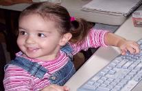 Playing on Mommy's computer.