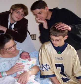 Big brothers Nolan (18), Alex (20), and Charles (13)