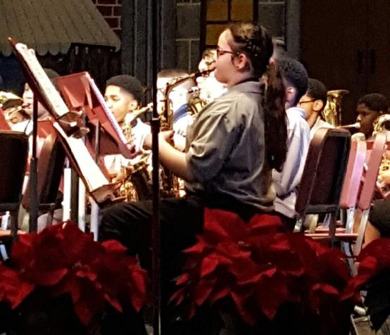6th Grade Band played Jingle Bells, Jolly Old St. Nicholas, The Dreidel Song, and Kwanzaa Celebration